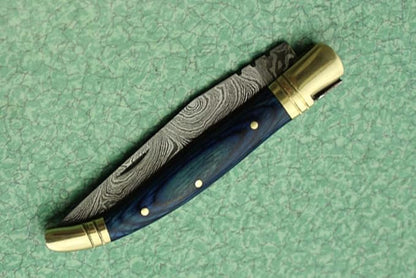 Laguiole Folding Damascus steel knife, 8.6" Long with 4" hand forged custom twist pattern Blade. Blue colored wood with brass bolster, Cow hide leather sheath included