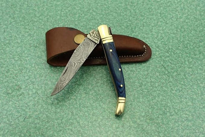 Laguiole Folding Damascus steel knife, 8.6" Long with 4" hand forged custom twist pattern Blade. Blue colored wood with brass bolster, Cow hide leather sheath included
